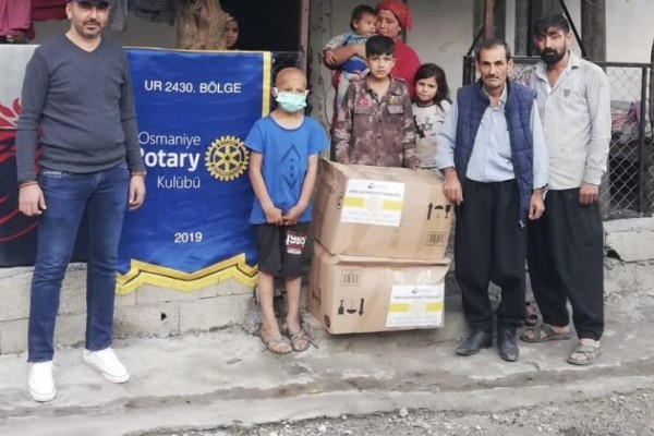 düşük gelirli ailelere yardım kolisi dağıtıldı